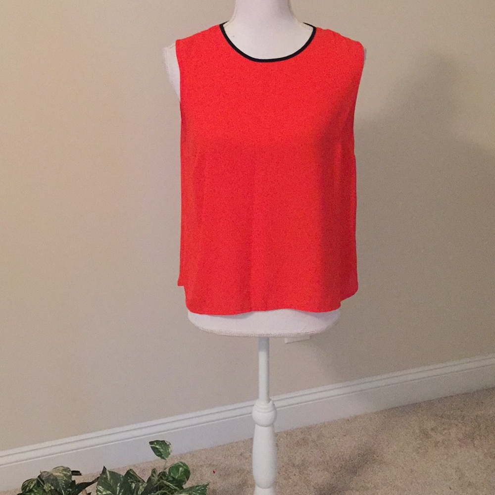 Dex bright orange blouse with black piping